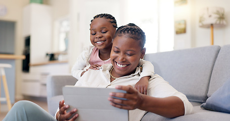 Image showing Family, woman with child and with tablet in living room of their home for social media. Technology or internet, streaming movie or bonding time and black mother with her daughter together happy