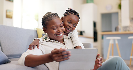 Image showing Family, woman with child and with tablet in living room of their home for social media. Technology or internet, streaming movie or bonding time and black mother with her daughter together happy