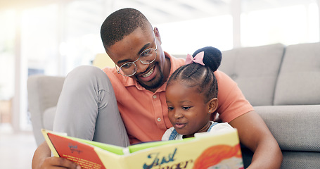 Image showing Reading, father and story with girl for learning in lounge for education or quality time. Kid, books and parent for support on floor or fun with growth for childhood at house with happy family.