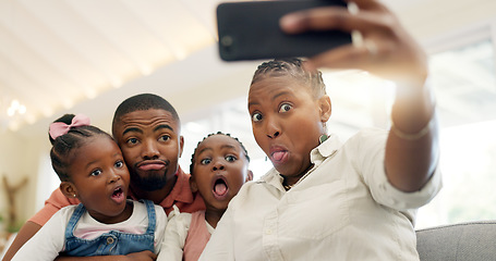 Image showing Black family, selfie and funny face, parents and kids at home, fun and bonding with memory for social media. Live streaming, playful and portrait, people with goofy expression in picture for post