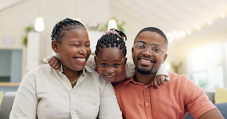 Image showing Black family, face and happy with parents and kid at home, love and bonding with hug and spending time together. Man, woman and girl child, happiness and portrait and people smile in living room