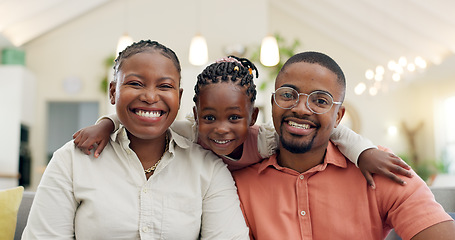 Image showing Black family, face and happy with parents and kid at home, love and bonding with hug and spending time together. Man, woman and girl child, happiness and portrait and people smile in living room