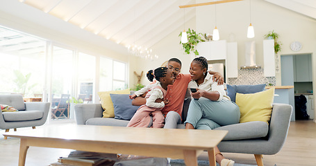 Image showing Support, black family on sofa and in living room of their home happy together smiling. Support or care, happiness or bonding time and African people cuddle on couch in their house for positivity