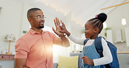 Image showing Black family, education and girl with backpack for school, kindergarten and high five from dad for support and motivation. Child, student and father helping to get ready and leave house in morning