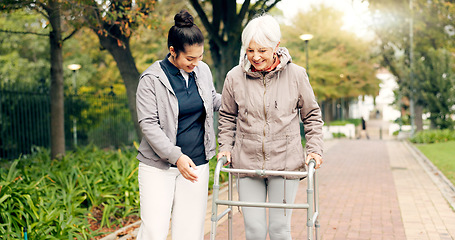 Image showing Senior woman, walker and nurse outdoor in a park with healthcare for elderly exercise. Walking, healthcare professional and female person with peace and physical therapy in a public garden with carer