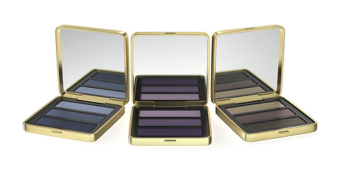 Image showing Compact eyeshadow palettes in gold boxes