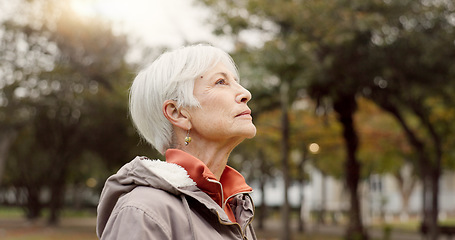 Image showing Freedom, nature and elderly woman breathing on vacation, holiday journey and winter travel. Park, fresh air and senior person outdoor for peace, calm and celebration for health, wellness and relax.