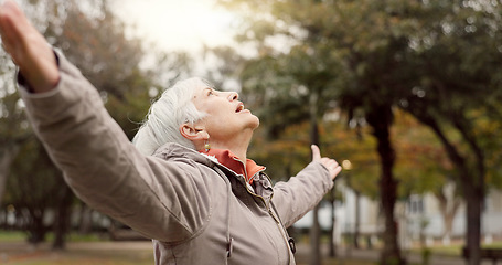 Image showing Freedom, nature and elderly woman breathing on vacation, holiday journey and winter travel. Park, fresh air and senior person outdoor for peace, calm and celebration for health, wellness and relax.