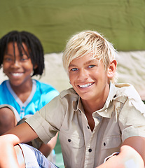 Image showing Portrait, happy children and friends in tent together, camping and relax outdoor on summer holiday. Face of young boys, campsite and kids smile for vacation travel, recreation adventure and leisure