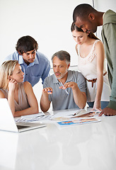 Image showing People, teamwork and paperwork or meeting brainstorming at creative agency, collaboration or problem solving. Diversity, documents and creativity idea pictures on desk for campaign, career or project