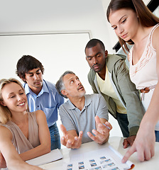 Image showing People, teamwork and problem solving with paperwork for creative design at magazine for brainstorming, collaboration or campaign, Man, woman and document in office for job, idea or project planning