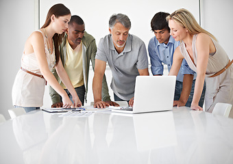 Image showing Men, women and laptop in meeting for creative collaboration at magazine agency for problem solving, project or proposal. Group, diversity and brainstorming for company ideas, campaign or planning