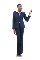 Image showing Business, black woman and pointing at presentation of advertising, mockup and show space isolated on a white studio background. Smile, professional and hand gesture for promotion, marketing or offer