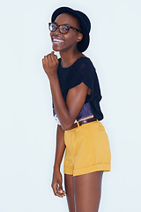 Image showing Fashion, beauty and portrait of African woman on a white background in trendy, stylish and casual clothes. Confidence, hipster style and isolated person with smile, glasses and happiness in studio