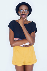 Image showing Funny, portrait and black woman with mustache in studio with hipster fashion and crazy person in background. Silly, nerd and geek with goofy style and comedy joke with trendy hat or unique outfit