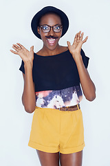 Image showing Crazy, fashion and portrait of woman with mustache in studio with hipster or funny nerd in white background. African, person and silly geek with goofy style and joke with trendy hat or unique outfit