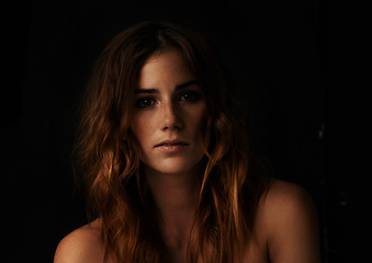 Image showing Woman, beauty and portrait with ginger hair, salon and haircut treatment in a studio. Natural, red head and female person from Ireland with cosmetics, hairstyle and balayage with black background