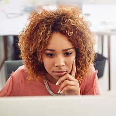 Image showing Workplace, reading or designer with laptop for research, editing or copywriting on blog in agency. Technology, online or African woman at desk working on internet update, networking or reading news