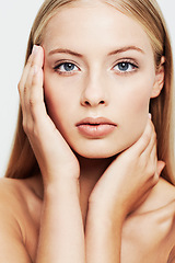 Image showing Woman, face and hands on skin for beauty, natural cosmetics and glamour on white background. Clean, skincare and dermatology with makeup, wellness and facial for treatment, makeover and portrait