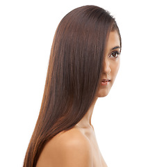 Image showing Hair care, health and young woman in studio for cosmetic, salon and beauty treatment. Wellness, confident and female person with shiny, long and conditioner hairstyle routine by white background.