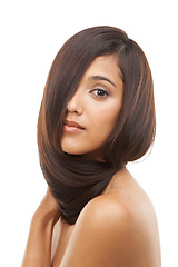 Image showing Hair care, texture and young woman in studio for cosmetic, salon and beauty treatment. Wellness, confident and portrait of female person with healthy shiny hairstyle routine by white background.