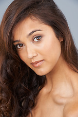 Image showing Portrait, beauty and hair of woman in salon at studio isolated on a grey background. Face, aesthetic and hairstyle of model in makeup cosmetics, hairdresser and treatment for care of skin glow