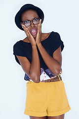 Image showing Portrait, fashion and shock with hipster black woman in studio on white background for reaction or alert. Wow, surprise or omg and young person in glasses with wtf emoji or facial expression