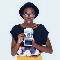 Image showing Woman, picture and camera in studio with shock, creativity and vintage in photography for media art. African person, surprise and face in creative production and photoshoot image by white background