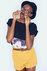 Image showing Portrait, funny and black woman with fashion, moustache or stylish clothes on white studio background. African person, model and girl with glasses and casual outfit with gen z or funky with aesthetic