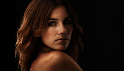 Image showing Woman, beauty and portrait with ginger hair, confidence and haircut treatment in a studio. Natural, red head and female person from Ireland with cosmetics, salon and balayage with black background