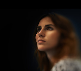 Image showing Thinking, cosmetic and young woman in studio with natural, beauty and self care routine. Dream, ideas and female person with cosmetology treatment and reflection face by black background with mockup.