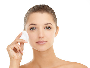 Image showing Face, skincare or cotton pad for woman in studio for wellness, shine or glow on white background. Cleaning, portrait or model with facial swab for makeup, removal and toner, application or skin detox