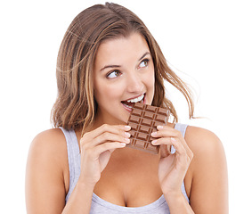 Image showing Woman, eating chocolate and love candy with mouth , pleasure and craving sugar in white background. Hungry, snack and meal for comfort, dessert and sweets for calories, diet and satisfaction