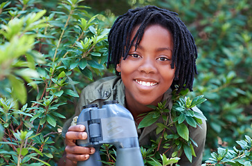 Image showing Nature portrait, binocular and black child happiness for travel adventure, outdoor exploration or bird watching trip. Tree leaf, face or African kid on search journey in forest, woods or eco jungle