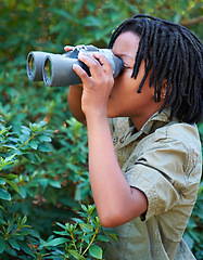 Image showing Nature trees, binocular and black kid watch wilderness view on adventure, outdoor exploration or camping trip. Sustainable forest, hiking tour and child search for destination in eco friendly woods