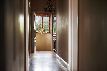 Image showing Corridor, hallway and design architecture in home with empty space, wooden floor and minimalist decoration. Room, apartment or hotel doorway with residential entrance, building interior and layout