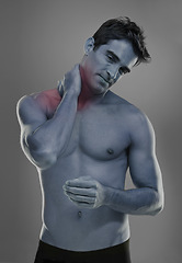 Image showing Man, neck pain or portrait in studio for medical crisis or muscle tension for injury of training. Model, joint ache or face by red glow of inflammation of sport accident or anatomy by grey background