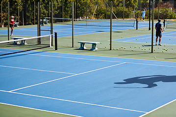 Image showing Floor, sports or people on tennis court for training, outdoor exercise or competitive match in summer. Shadow, athletes or workout for health or fitness with wellness on the ground ready for a game