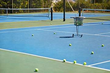 Image showing Sport, empty or tennis balls on court for training, outdoor exercise or competitive match in summer. Workout, background or floor for health or fitness with equipment on the ground ready for a game