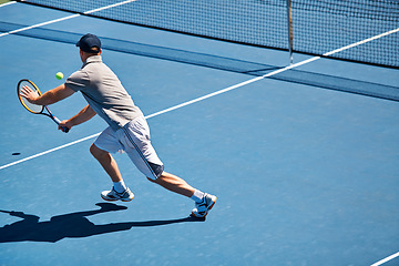 Image showing Sport, man and tennis on court with fitness, competition and performance outdoor with match and energy. Athlete, player and ball on turf for training, exercise and racket with skill, game and hobby
