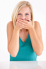 Image showing Woman, gossip and cover mouth in portrait with funny, surprise and announcement in studio on white background. Wow, shocked and girl with hands on face for crazy fake news, secret or story of drama