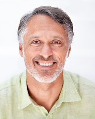 Image showing Portrait, mature man and happy in studio for old age retirement and wellness with wrinkles on break. Person, face and senior guy with pride with grey beard, positive and relax by white background