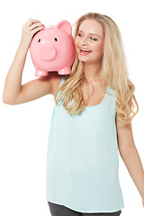 Image showing Happy, piggy bank and woman on a white background for money, savings and investment in studio. Finance mockup, cash container and excited isolated person smile for budget, investment and profit