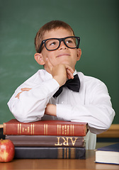 Image showing Boy child, books and school with thinking, ideas or information for knowledge, solution and classroom. Student kid, problem solving and brainstorming for education, learning or development with books