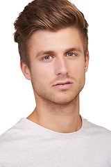 Image showing Man, portrait and serious in studio with fashion, casual outfit or style with calm expression or pride. Person, face and confident with attitude or aesthetic trendy clothes on white background