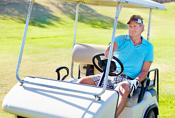 Image showing Man, golf cart and relax driving on grass for sports exercise or competition, challenge or holiday. Mature person, face and field transport on course for professional training, game or tournament