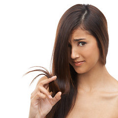 Image showing Hair, woman and stress in studio with portrait for shampoo texture, treatment damage and keratin hairloss. Model, face and frustrated with salon for haircare, split ends or mockup on white background