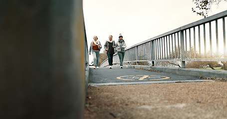 Image showing Senior women group, bridge and fitness with power walk, jog or training together for health in retirement. Elderly lady team, light running and moving for exercise, outdoor workout or support in park