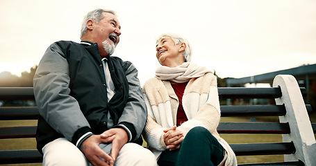 Image showing Retirement, laugh and Senior couple on bench at park with happiness or bond for quality time. Love, happy face and elderly woman or man in nature with support or embrace for trust or laugh together.