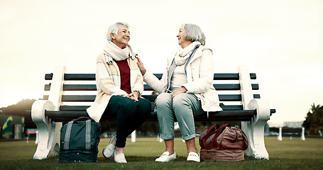 Image showing Women, bench or old people talking in park or nature speaking or bonding together in retirement outdoors. Senior, elderly or mature woman in conversation to relax with peace or care on holiday break